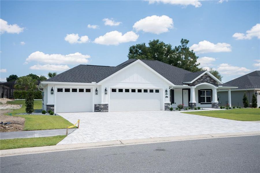 Front exterior of a new home in , Dunnellon, FL, highlighting curb appeal (Image 16).