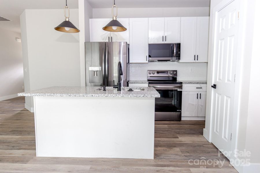 Furnished interior view inside a new home in , Hickory (Image 7).