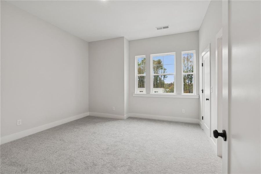 Spacious, unfurnished interior of a new home in Settingdown Farms, Cumming (Image 15).