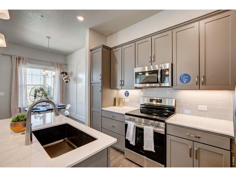 Furnished interior view inside a new home in Highlands at Fox Hill - Discovery, Longmont (Image 20).