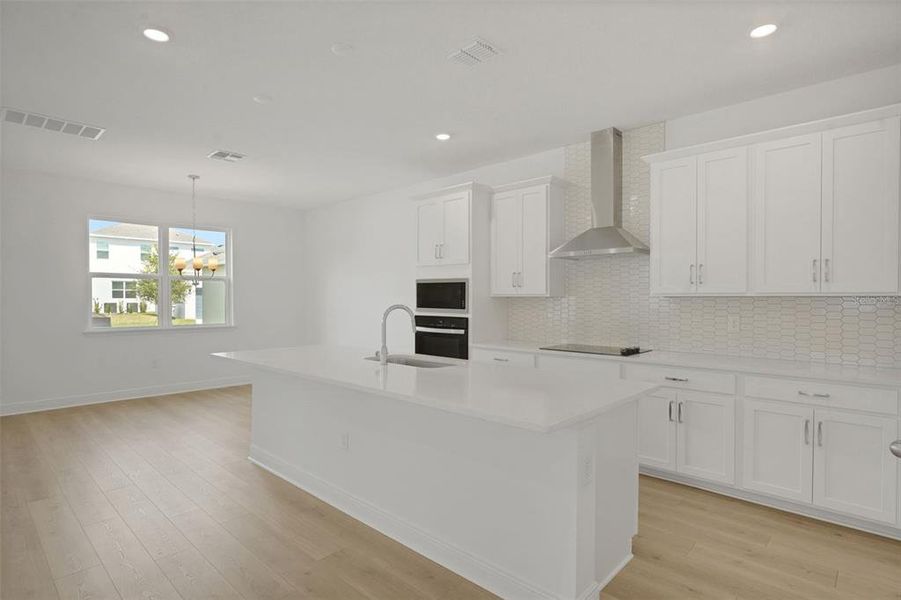 Furnished interior view inside a new home in Crossroads at Kelly Park, Apopka (Image 11).