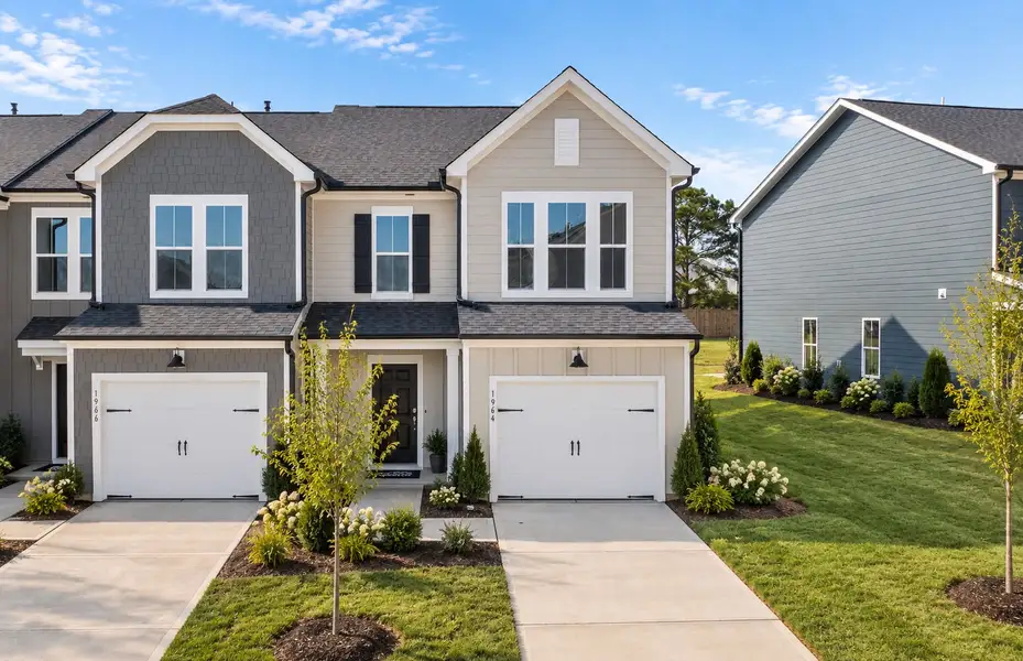 Front exterior of a new home in Saunders Farm, Willow Spring, NC, highlighting curb appeal (Image 23). Front exterior of a new home in Saunders Farm, Willow Spring, NC, highlighting curb appeal (Image 23).