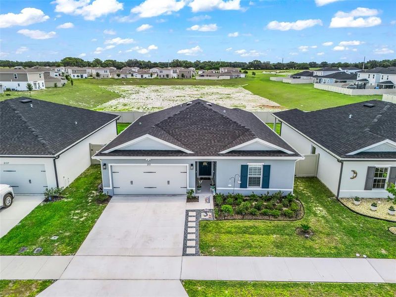 Front exterior of a new home in , Sumterville, FL, highlighting curb appeal (Image 2).