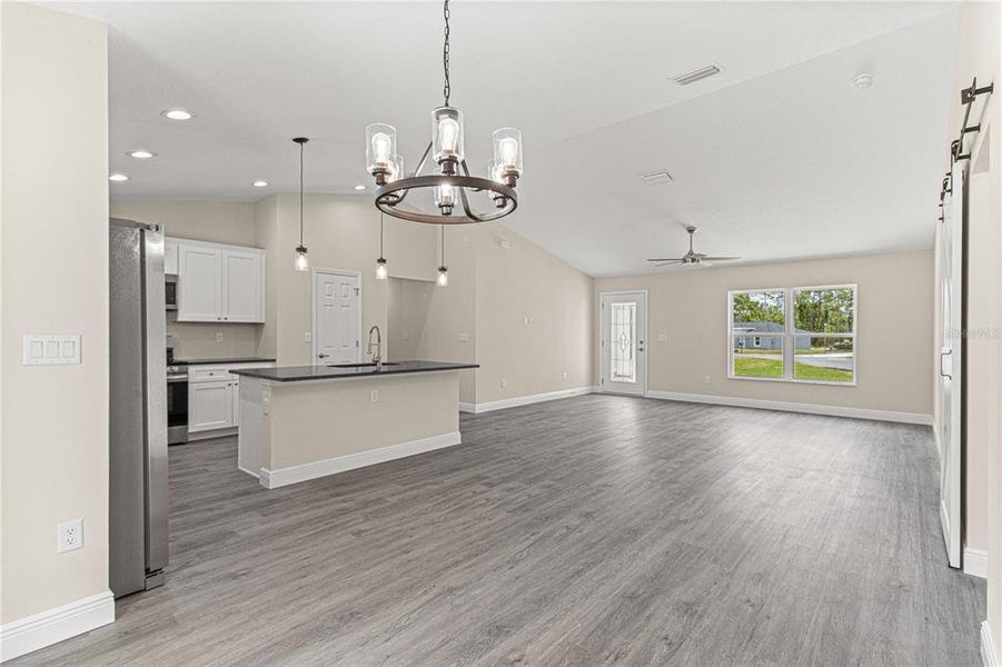 Dining room with access to French doors leading to  he lanai