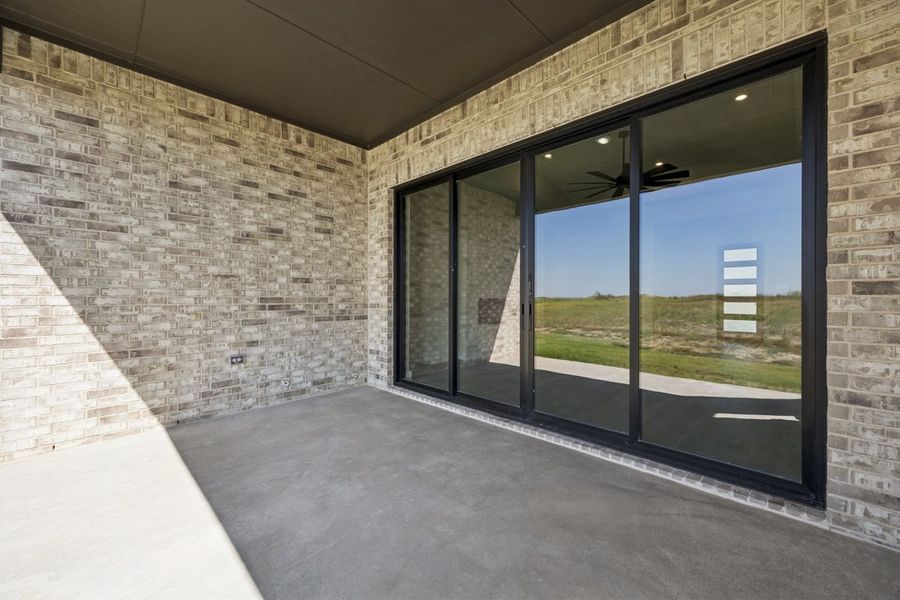 Exterior details and patio area of a home in Coppenger Place, Godley (Image 20).