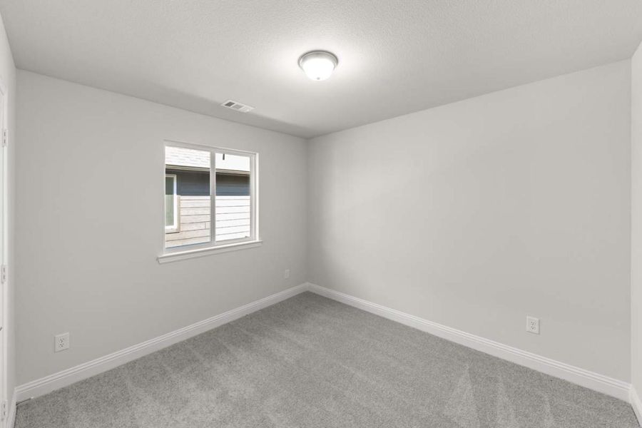 Spacious, unfurnished interior of a new home in Keeneland, Aubrey (Image 15). Spacious, unfurnished interior of a new home in Keeneland, Aubrey (Image 15).