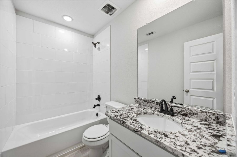 Furnished interior view inside a new home in Alicante, Houston (Image 3).