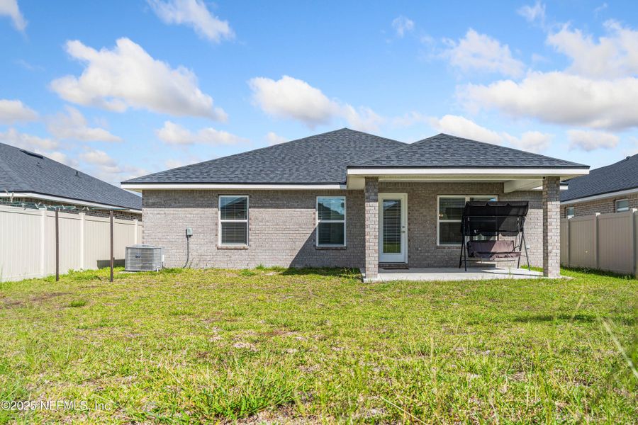 Front exterior of a new home in Shadow Crest at Rolling Hills, Green Cove Springs, FL, highlighting curb appeal (Image 1).