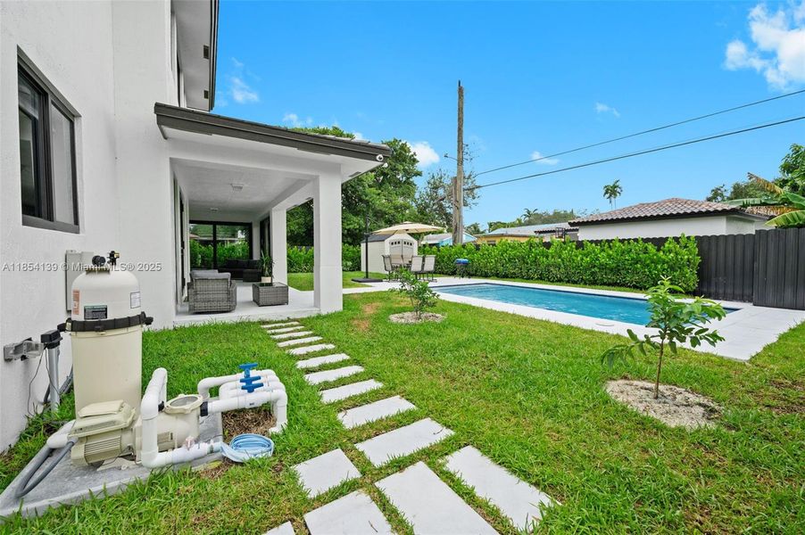 Front exterior of a new home in , Miami Springs, FL, highlighting curb appeal (Image 22).
