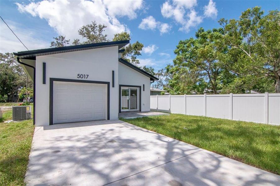 Front exterior of a new home in , Gulfport, FL, highlighting curb appeal (Image 30).