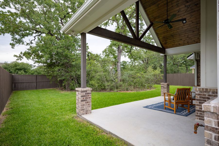Exterior details and patio area of a home in Oakmont, Bryan (Image 30).