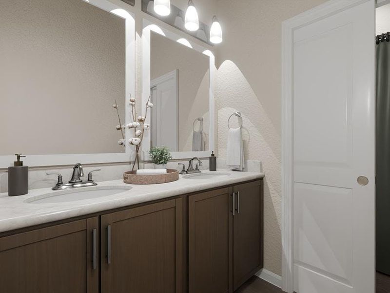 The secondary bedrooms share a dual-vanity hall bath. (Artist`s rendering)