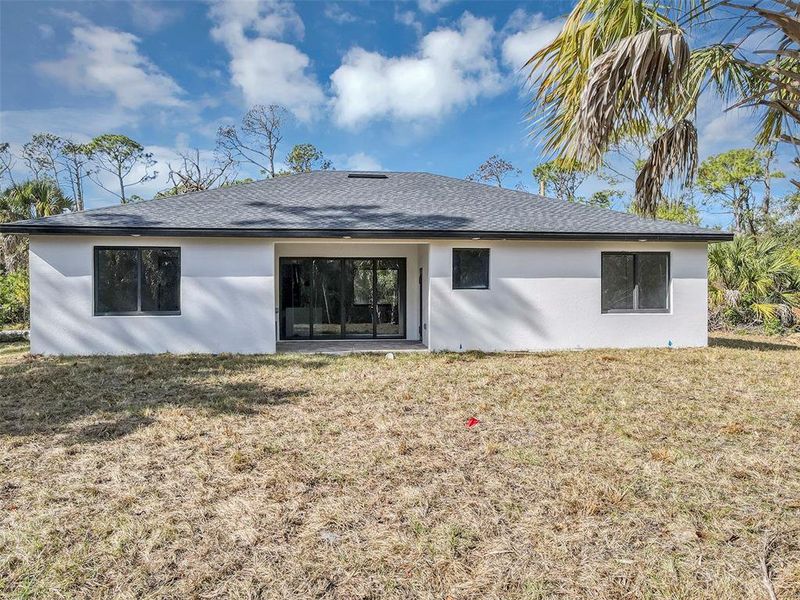 Exterior details and patio area of a home in , Port Charlotte (Image 29).
