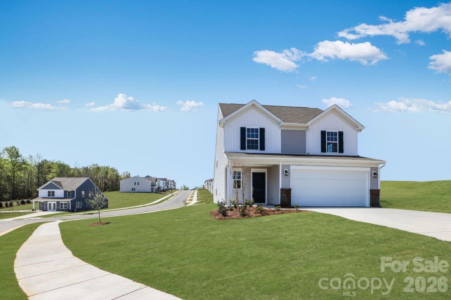 Front exterior of a new home in Cleveland Hill, Shelby, NC, highlighting curb appeal (Image 2). Front exterior of a new home in Cleveland Hill, Shelby, NC, highlighting curb appeal (Image 2).