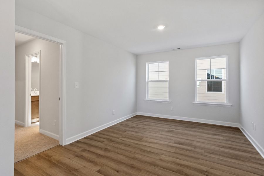 Spacious, unfurnished interior of a new home in Sweetbrier, Durham (Image 22).