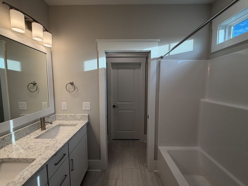 Furnished interior view inside a new home in Songbird, Hampstead (Image 13).