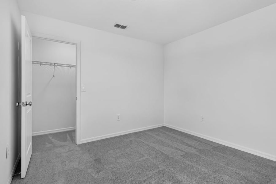 Representative unfurnished interior of a home built from the Kingfisher by Taylor Morrison in Waterstone, Groveland (Image 38).