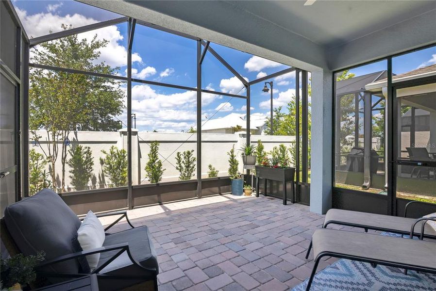 Exterior details and patio area of a home in Del Webb Oasis, Winter Garden (Image 24).