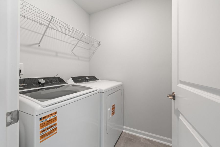 Close-up of interior finishes inside a home in Poets Walk, Whitsett (Image 12).