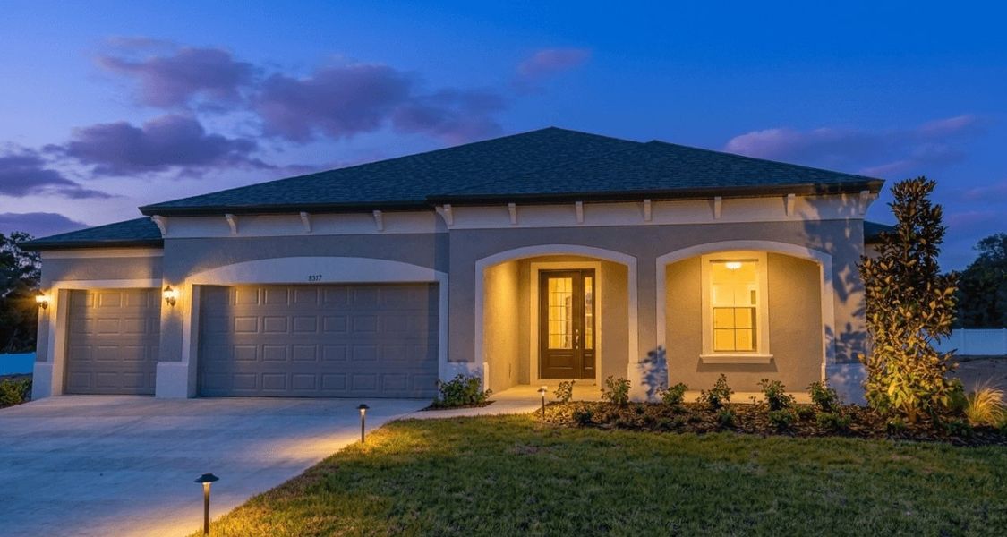 Representative exterior photo of a completed home built from the Sapphire by William Ryan Homes in River Preserve Estates, Parrish, FL (Image 22). Representative exterior photo of a completed home built from the Sapphire by William Ryan Homes in River Preserve Estates, Parrish, FL (Image 22).