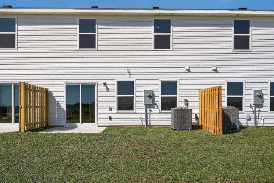 A house with a large front yard.