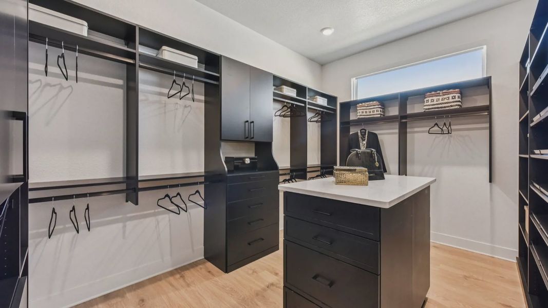 Representative furnished interior of a home built from the Garet by Chesmar Homes in Feathergrass, Florence (Image 18).