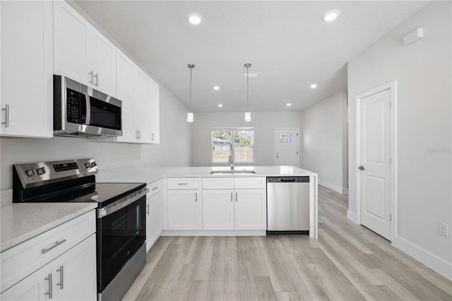 Furnished interior view inside a new home in , Ocala (Image 7).