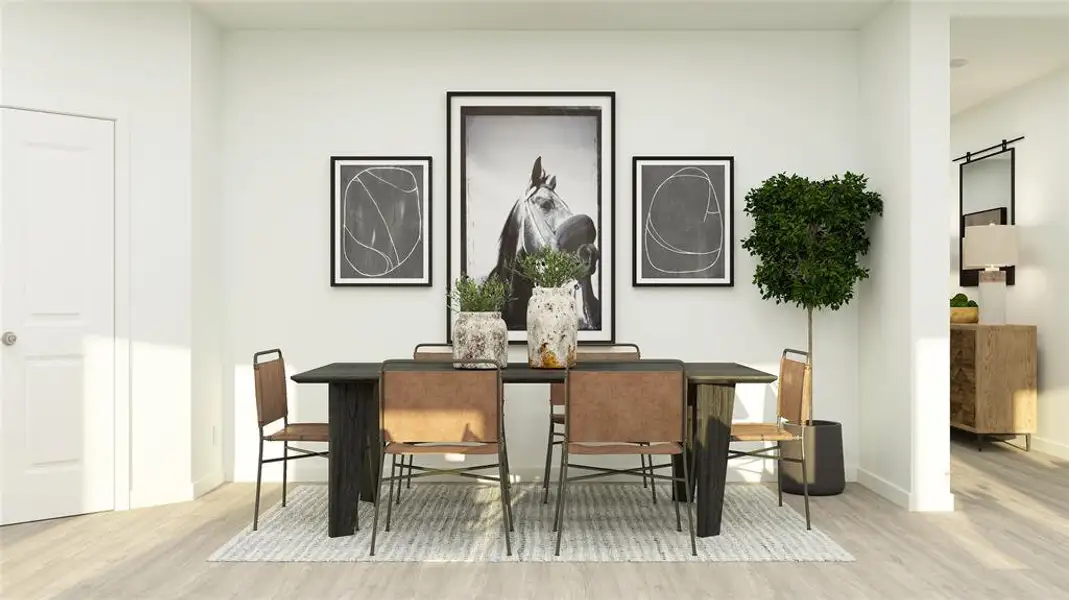 Dining area with light hardwood / wood-style floors