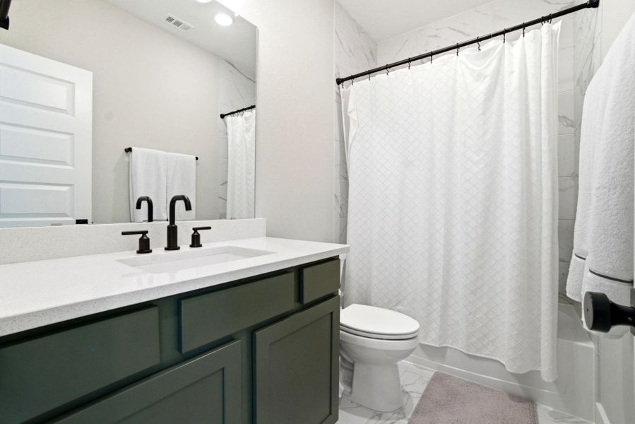 Furnished interior view inside a new home in Woodforest - Kingsley Square 50' Homesites, Montgomery (Image 31).