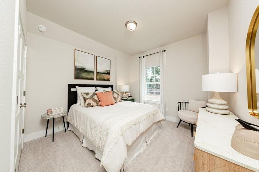 Furnished interior view inside a new home in Bridgeland, Cypress (Image 11).