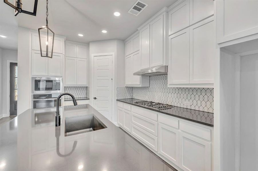 Furnished interior view inside a new home in Treeline, Justin (Image 15).