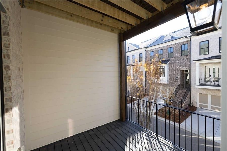 Main level covered deck space off the sunroom * Image is of a previously built home* Main level covered deck space off the sunroom * Image is of a previously built home*
