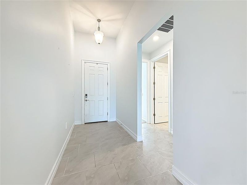 Spacious, unfurnished interior of a new home in , Port Charlotte (Image 28).