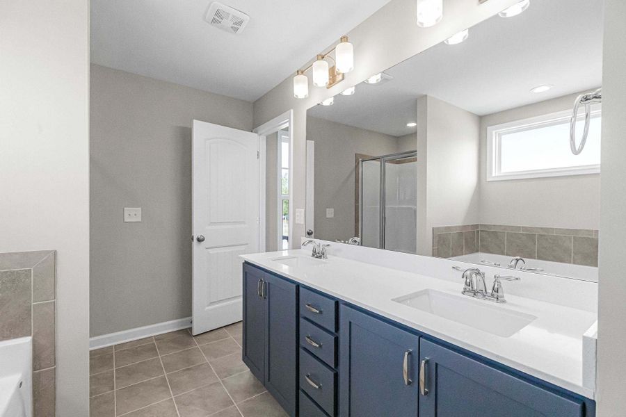 Representative furnished interior of a home built from the Aberdeen by Caviness & Cates Communities in Bartlett Manor, Youngsville (Image 190).