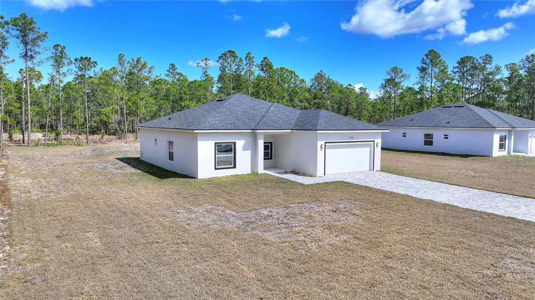 Exterior details and patio area of a home in , Indian Lake Estates (Image 22).