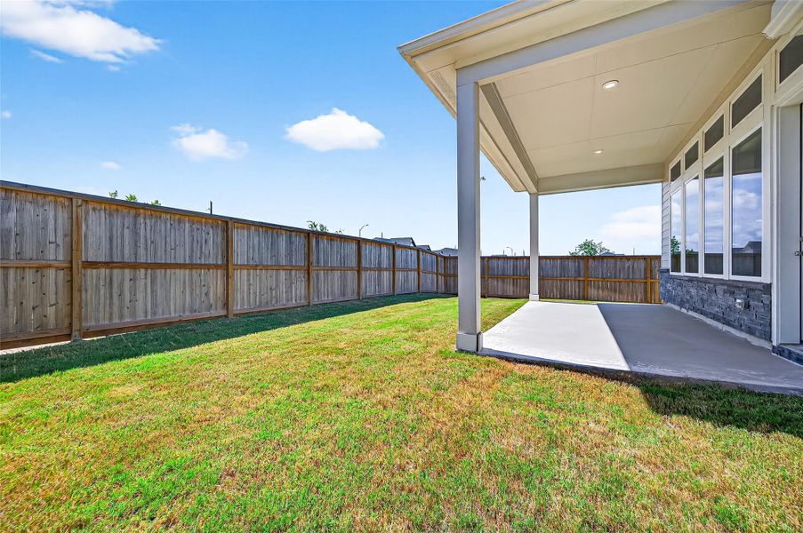 Exterior details and patio area of a home in Jordan Ranch: Signature Series, Katy (Image 1).