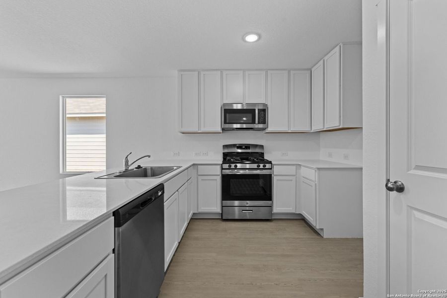 Furnished interior view inside a new home in Lodi Grove, Floresville (Image 8).