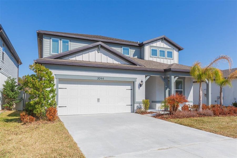 Front exterior of a new home in Valri Forest, Valrico, FL, highlighting curb appeal (Image 23). Front exterior of a new home in Valri Forest, Valrico, FL, highlighting curb appeal (Image 23).