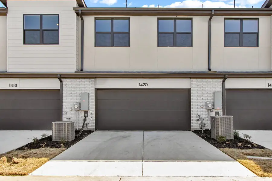 Front exterior of a new home in Willow Grove Townhomes, Melissa, TX, highlighting curb appeal (Image 27).