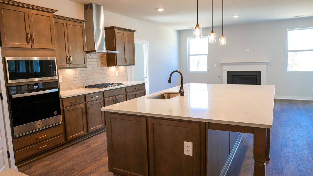 Representative furnished interior of a home built from the TISDALE by D.R. Horton in Harvest Point, Spring Hill (Image 13).