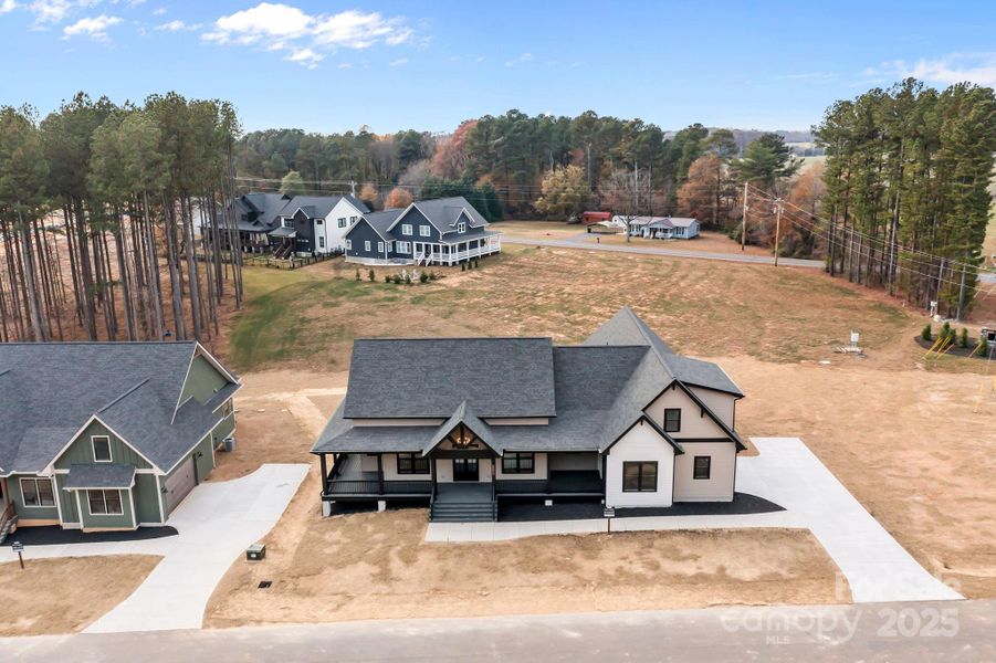 Front exterior of a new home in , Statesville, NC, highlighting curb appeal (Image 24). Front exterior of a new home in , Statesville, NC, highlighting curb appeal (Image 24).