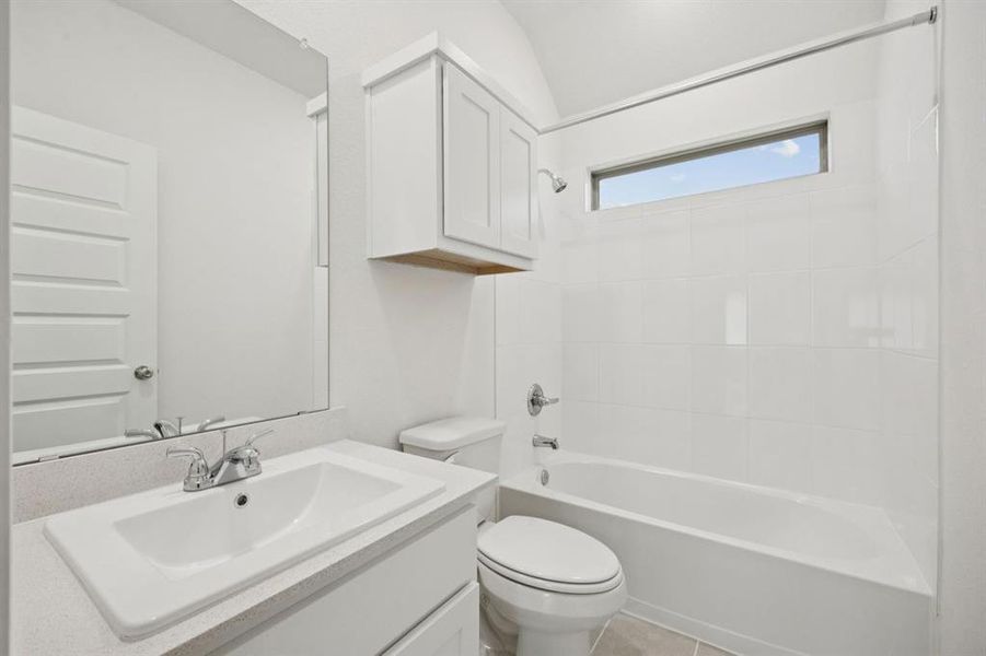 Bathroom in the Cypress home plan by Trophy Signature Homes - REPRESENTATIVE PHOTO