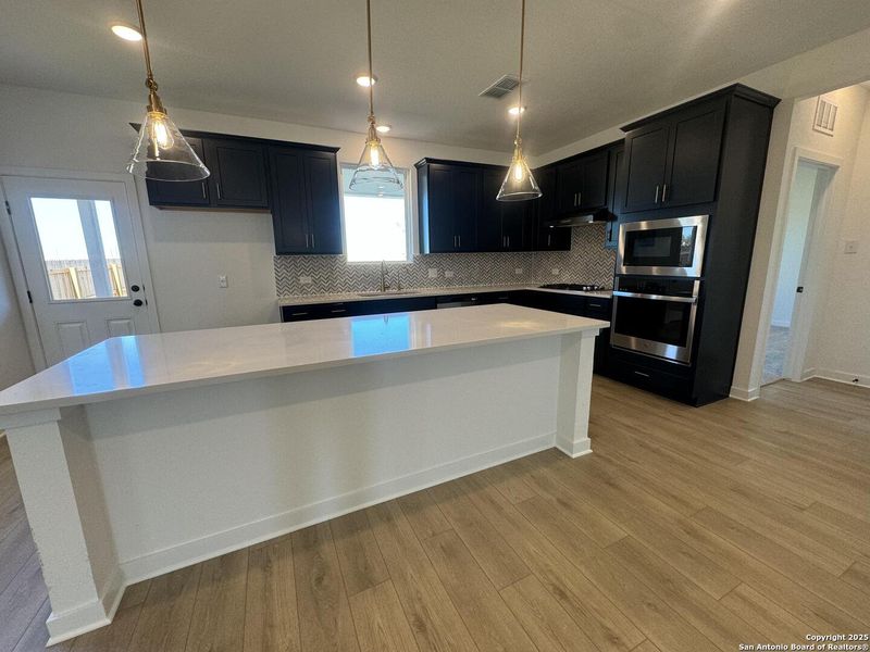 Furnished interior view inside a new home in Enclave at Hennersby Hollow 50's, San Antonio (Image 8).