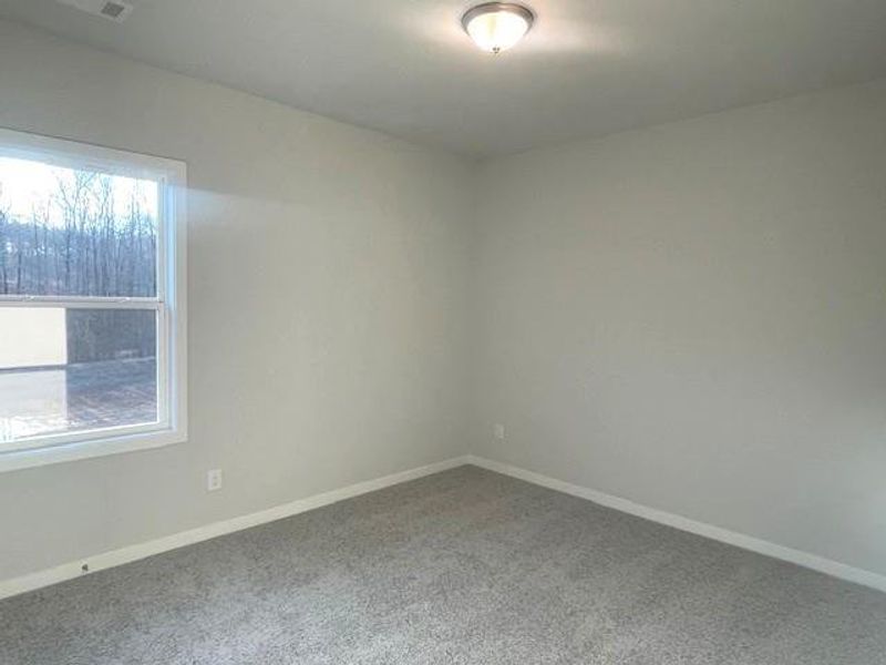 Spacious, unfurnished interior of a new home in Ponderosa Farms Estates, Gainesville (Image 35).