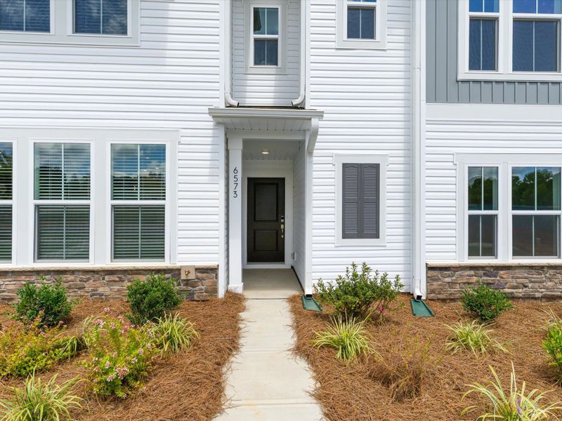 Exterior details and patio area of a home in Westwood Reserve, Charlotte (Image 25). Exterior details and patio area of a home in Westwood Reserve, Charlotte (Image 25).