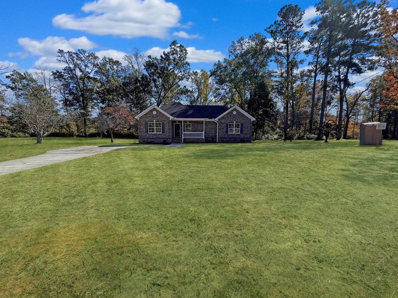 Front exterior of a new home in , Orangeburg, SC, highlighting curb appeal (Image 17). Front exterior of a new home in , Orangeburg, SC, highlighting curb appeal (Image 17).