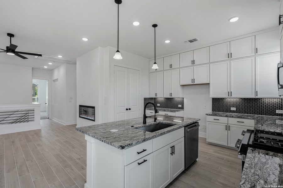 Furnished interior view inside a new home in Rose Hill, San Antonio (Image 12).
