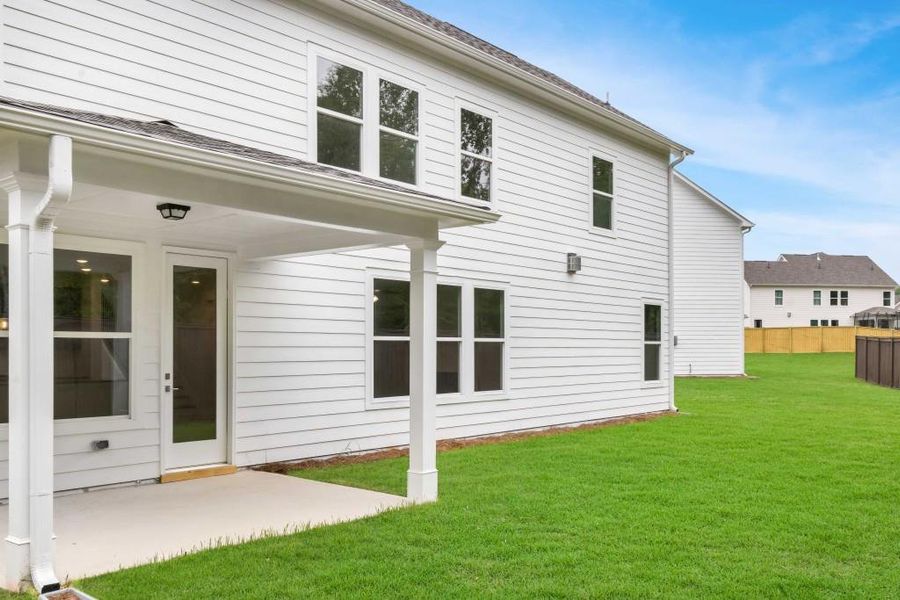 Exterior details and patio area of a home in Maddox Landing, Hoschton (Image 20).