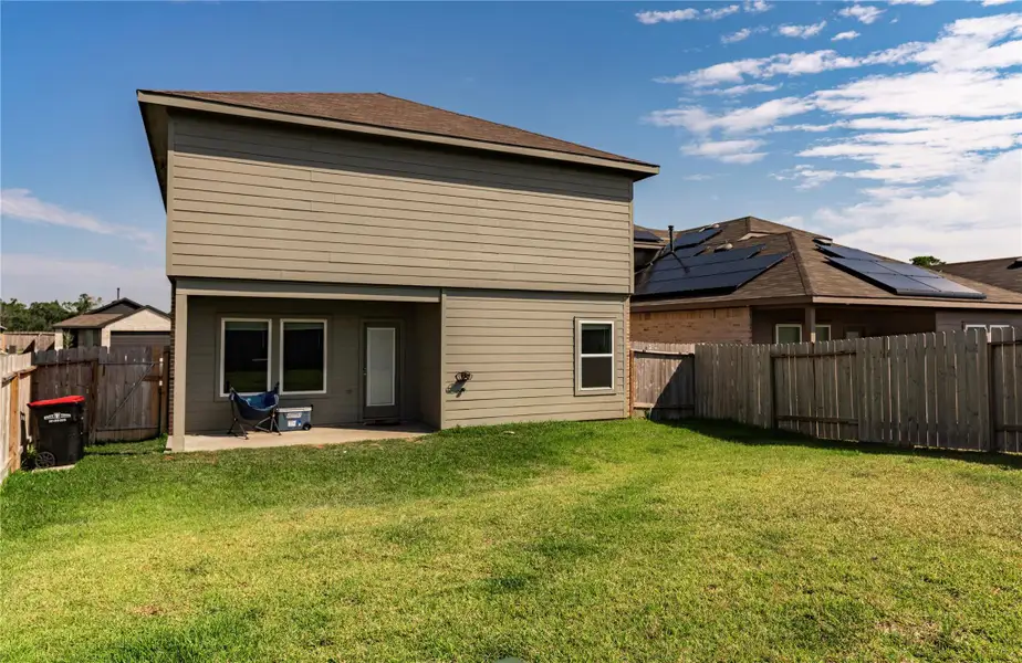 Exterior details and patio area of a home in , Spring (Image 3). Exterior details and patio area of a home in , Spring (Image 3).
