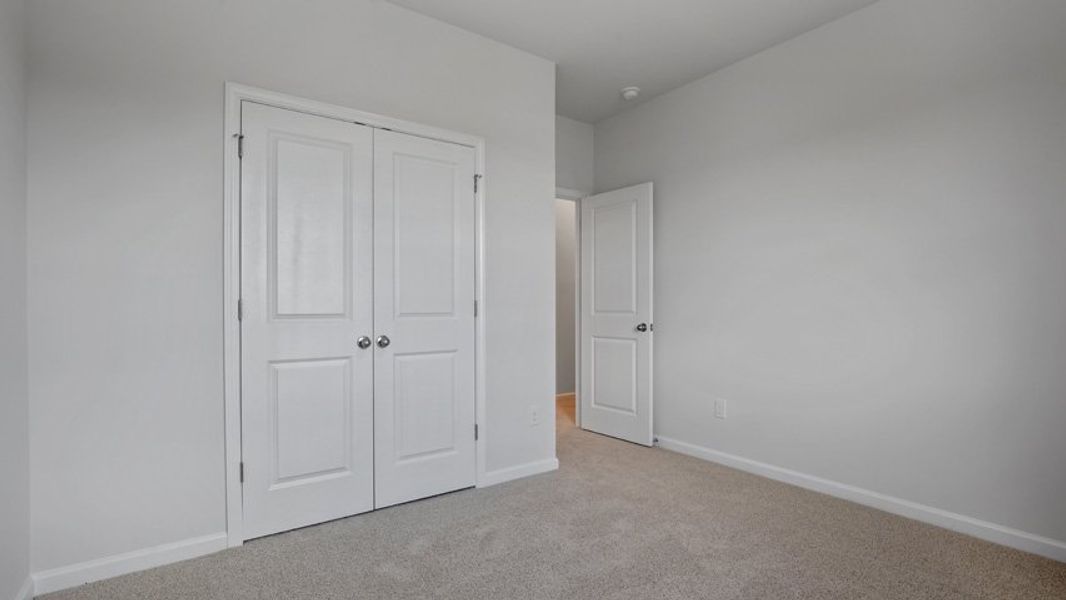 Representative unfurnished interior of a home built from the Lucas by D.R. Horton in The Manors at Haywood Glen, Knightdale (Image 31).